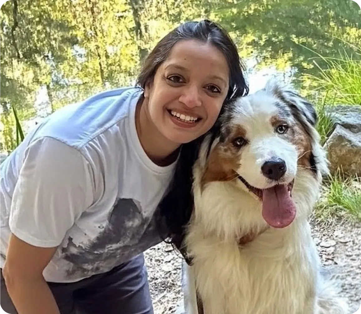 Alisha with her Australian Shepherd