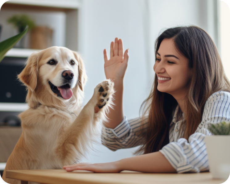 A happy client high-fiving their dog